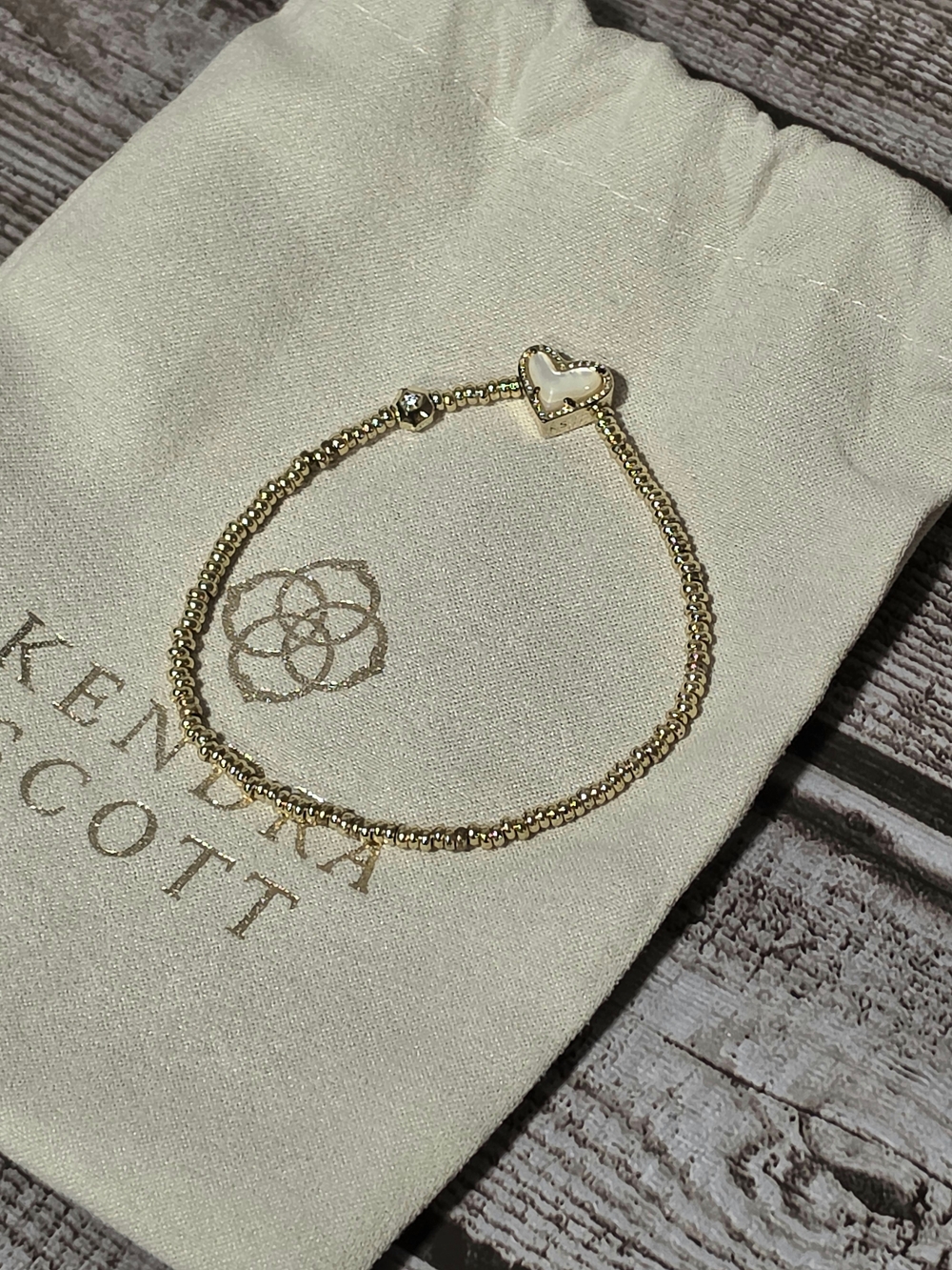 Kendra Scott Gold Ari Stretch Bracelet With Ivory Mother of Pearl Heart Accent - Picture 1 of 7